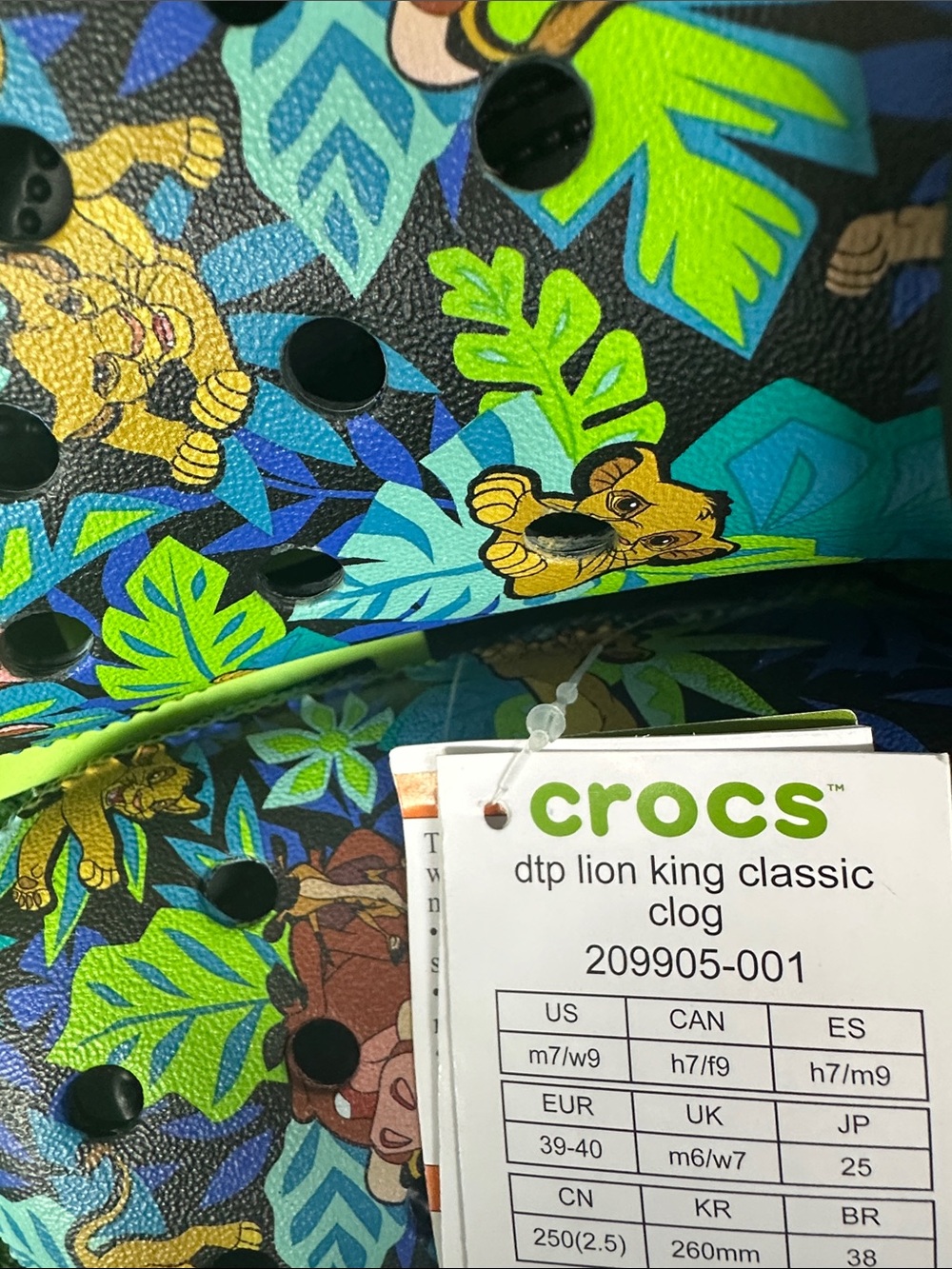 CROCS Kids' Black Tropical Lion King Sandals - Picture 2 of 11